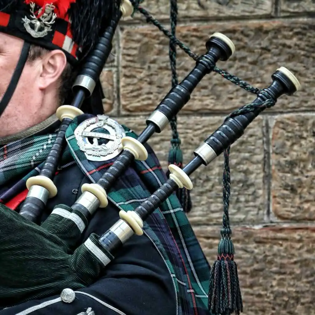 Illustrative Highland piper and bagpipes